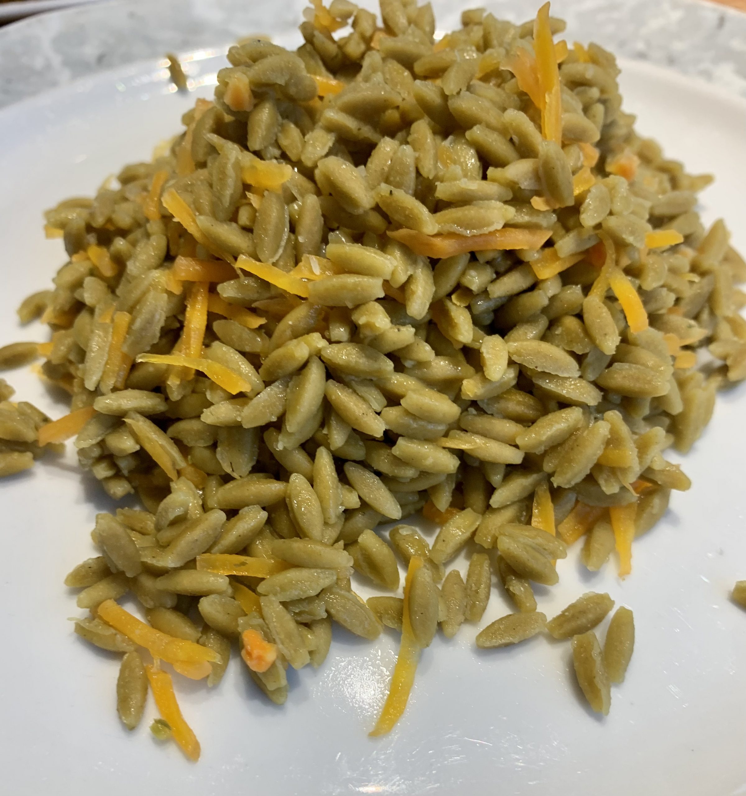 Erbsen und Zucchini à la Reis mit Möhren