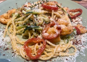 mit Parmesan bestreuen