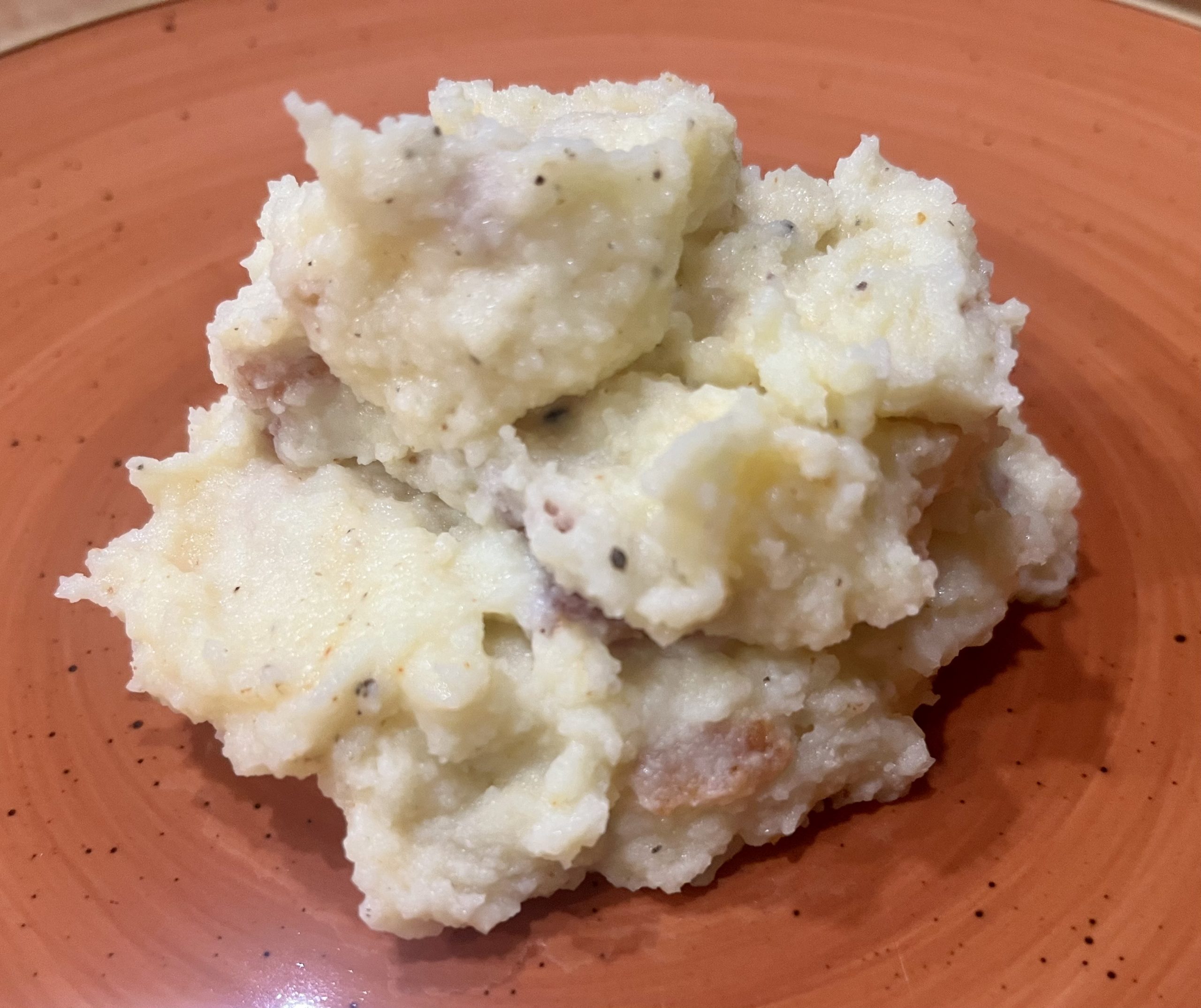 Kartoffelpüree mit gebratenem Bacon
