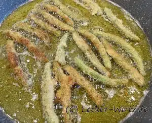 Frittierte Bohnen in der Pfanne