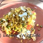 Huevos revueltos con paella - Rührei mit Paella