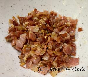 Südtiroler Speck mit Knoblauch anbraten