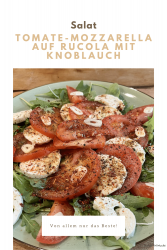 Tomato-mozzarella on rucola with garlic