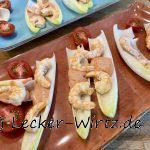 Gebratene Garnelen auf Chicorée mit Cocktailsauce
