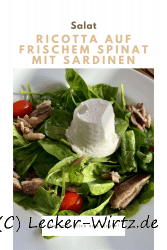 Ricotta auf frischem Spinat mit Sardinen