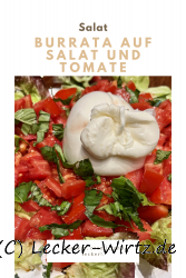Burrata auf Salat und Tomate