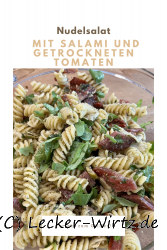 Colourful pasta salad with salami and dried tomatoes