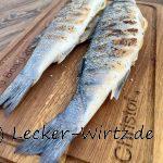Mediterraner Wolfsbarsch vom Schwenkgrill